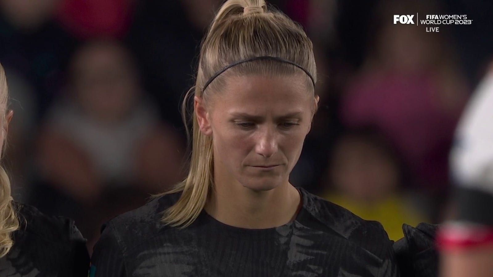 New Zealand and Norway share a moment of silence before the match